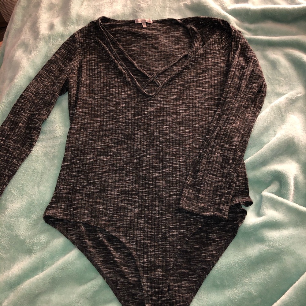 Body suit with straps